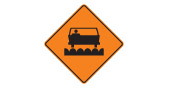 Milled or grooved pavement road safety sign