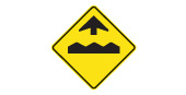 Bump or uneven pavement ahead road safety sign