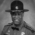 Photo of Washington State police chief John Batiste smiling at the camera