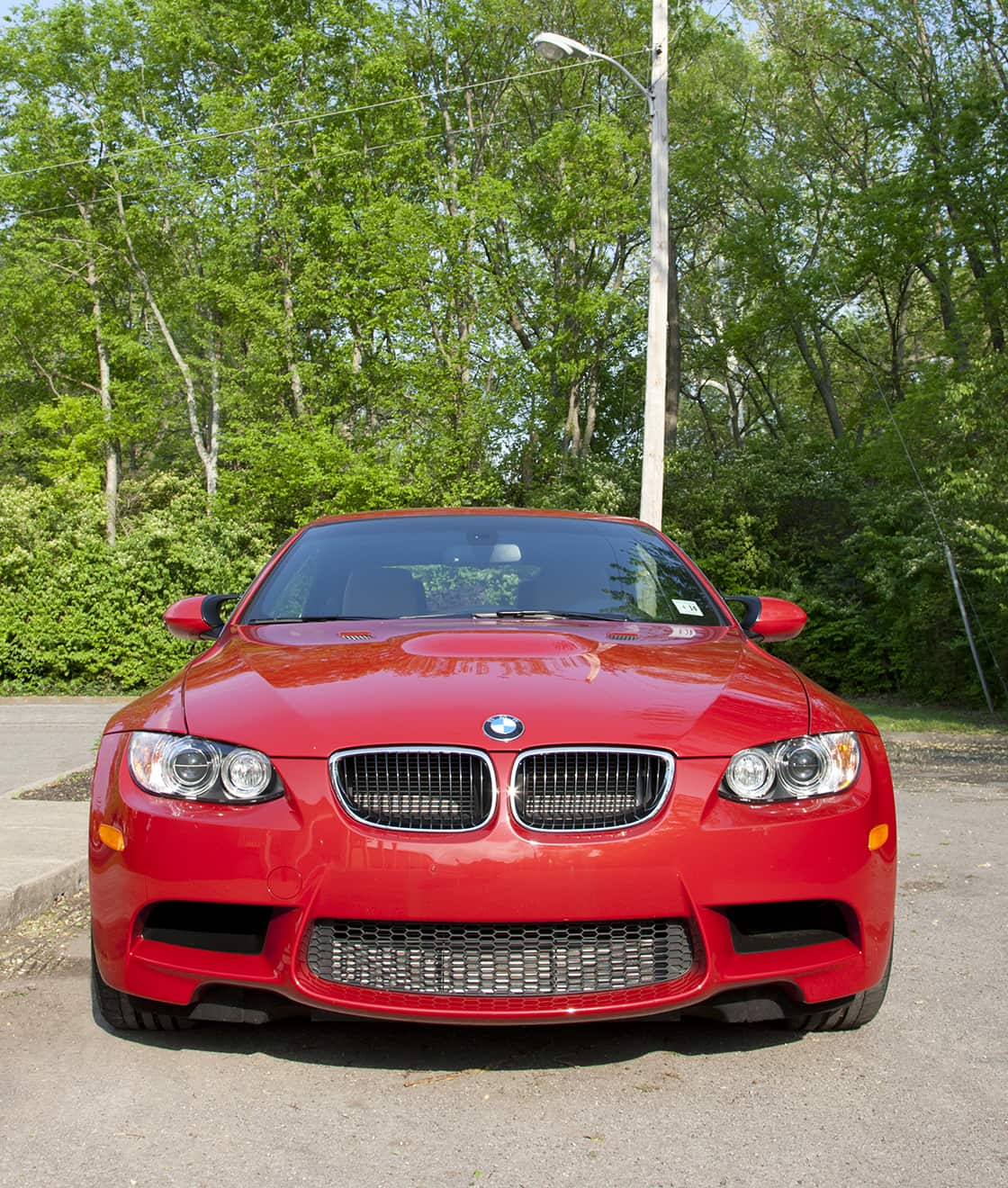 Red BMW at the park