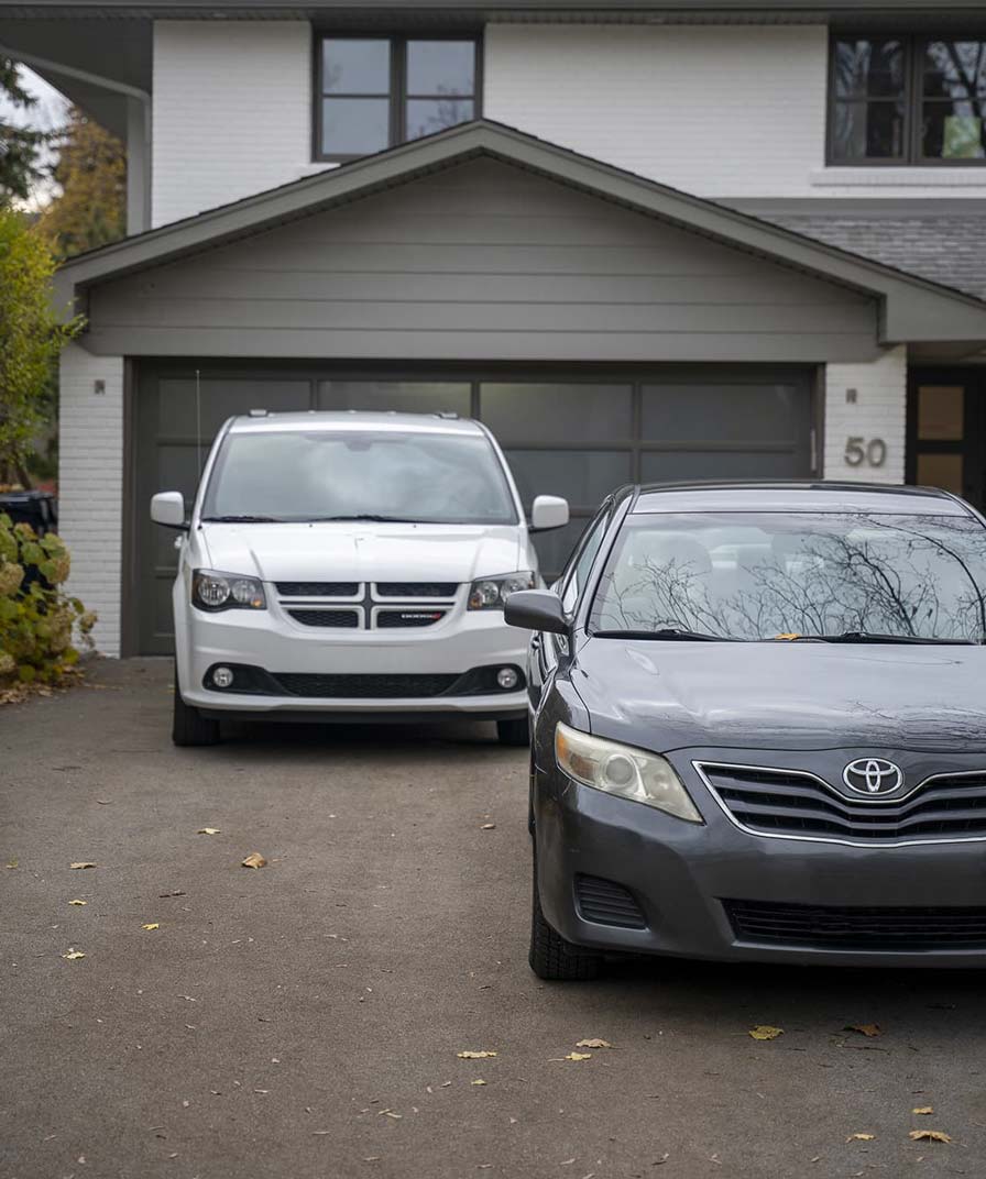 Vehicles in Driveway