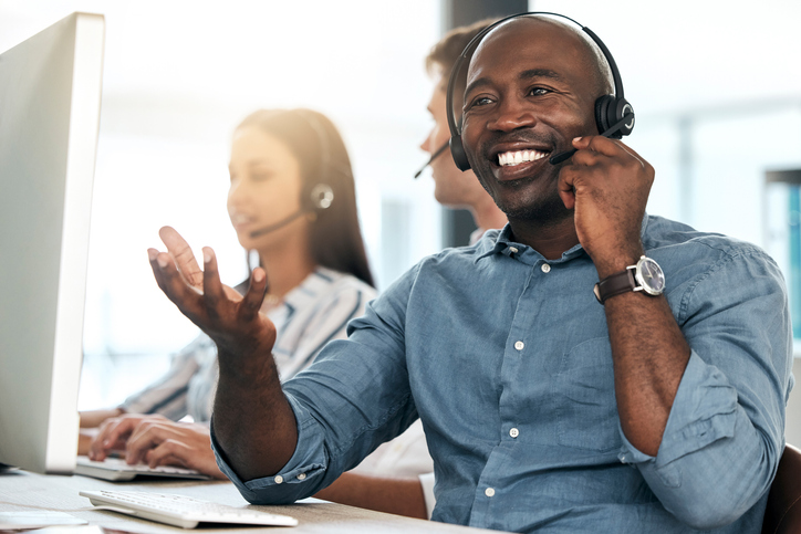 Man taking a call in a call centre